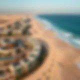 Aerial view of Dubai's golden sandy beaches showcasing luxurious properties nearby