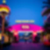 A vibrant view of the Global Village entrance decorated with lights